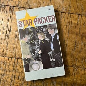 Vintage Star Packer VHS with Yellow Star and Maroon Title